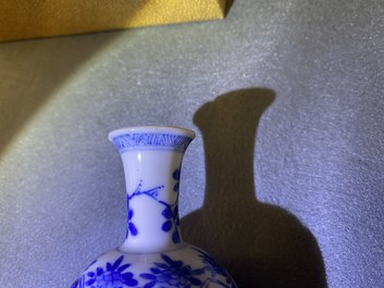 Five Chinese mostly blue and white vases, Kangxi